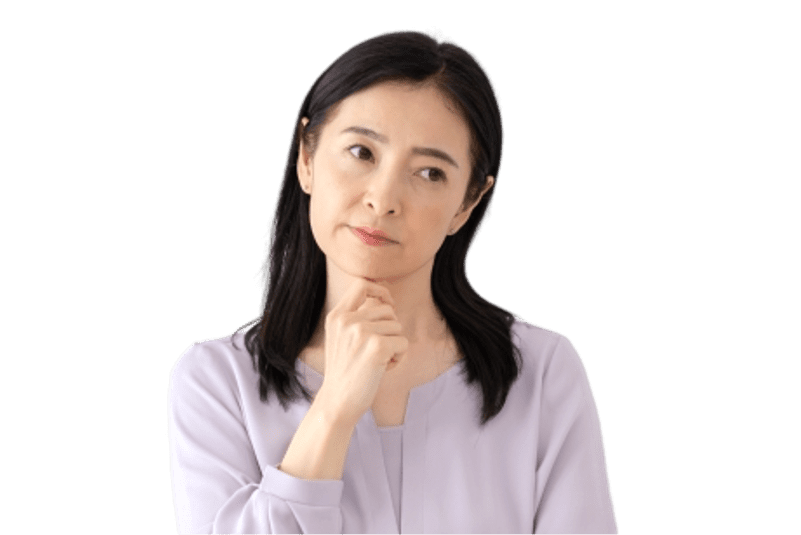 顎に手を当てて考える女性